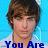 A pixelated image of a person with brown hair and a white shirt against a blue background, with blue text reading "You Are The Music In Me".