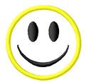 Static yellow smiley face icon with black oval eyes and curved mouth on white background, rendered in low-resolution pixel art style.