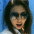 A person with long dark hair and sunglasses appears in three against a blue background, with the bottom-right missing