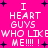 Pixelated text on bright pink background with black plus signs, repeating 'I HEART GUYS WHO LIKE ME!!!!' in white block letters.