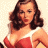 A vintage pinup-style image of a woman in a red dress with white straps on the left, next to green pixelated text reading "Original Icons .com" on a dark background.