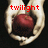 Red text reading 'twilight' appears above a pixelated red apple held by two light-colored hands against a black background.