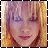 Pixelated close-up of a person with blonde hair and closed eyes, showing subtle facial expression changes between frames.
