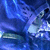 Animated blue fabric with light reflections shifts across four , showing subtle motion in the material's folds and highlights