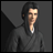 Pixelated image of a person with long dark hair in a dark robe against a gray background, next to text reading 'AnimeIM' and 'com' on black.