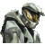 Pixelated figure in silver armor with black accents, helmeted head turned right, holding a shield on left side.