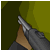 Pixelated image of a hand holding a silver knife against a green and dark background.