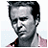 A 48x48 pixel buddy icon split into two sections: a grayscale portrait of a man on the left and green text reading "Original Icons .com" on a dark green background on the right.