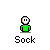 Pixelated green figure with white head and black eyes in multiple poses including speech bubbles, hand gestures, and motion effects.