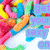 Colorful pixelated candy-like shapes with text overlay reading 'get your sexy on' in light blue letters.