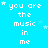 Pixelated text 'you are the music in me' repeated across a bright blue background with scattered white stars.