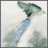 Pixelated static icon of a green and blue abstract creature with elongated body against light background