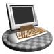 A computer monitor with a silver frame, brown keyboard, and white mouse on a checkered base rotates through multiple angles while two golden spheres appear and disappear.
