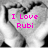 A pixelated heart-shaped icon with pink text reading "I Love Rubi" over a grayscale background.