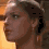 A four- shows a person with light brown hair in a headband, transitioning from profile to front-facing view with changing expressions