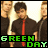Animated contact sheet of a band member in black shirt and red tie with "GREEN DAY" text overlay across multiple frames showing subtle pose changes.