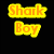 Pixelated text in bright colors on black background: 'Shark Boy' top-left, 'Is My Man.' bottom-left with purple-blue letters and pink outline.