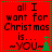 Red background with black text reading "all I want for Christmas is... ~YOU~" and a small green tree icon, framed by a dotted border.