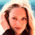 A pixelated image split into two sections: a person with light brown hair on the left and green text reading 'Original Icons .com' on the right against a dark background.