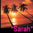 Pixelated sunset scene with palm trees and water reflection, featuring pink text 'Sarah' on a black background.