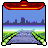Pixel art scene showing a red and orange flying saucer above a cityscape with purple buildings, blue sky, and green fields leading to a purple road.