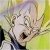 Pixelated image of a figure with light-colored hair, closed eyes, and a dark mouth, set against a blurred green and yellow background.