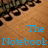 A static image showing a wooden floor with a of black shoes and blue text reading 'The Notebook' above a couple kissing