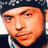 Two side-by-side frames of a pixelated animated icon showing a person with dark hair and a headband in different poses against a gray background.