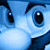 Pixelated blue cartoon character face with large eyes and dark eyebrows on left, green text 'Original Icons .com' on right.