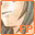 Two side-by-side pixelated frames show a figure with light skin and brown hair, wearing dark clothing; the left frame has orange 'FP' text while the right shows gray 'FP' text.