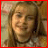 A four- of a person with long light brown hair wearing a dark choker and patterned top, with text overlays in each