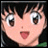 Pixelated anime-style character face with large eyes and open mouth next to stylized text on black background