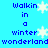 Blue background with blue text reading "Walkin in a winter wonderland" and white snowflakes, some of which animate.