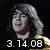 Pixelated image of a person with long hair in yellow and dark clothing, showing text overlays across four