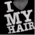 Black background with white text "I MY HAIR" and a gray heart symbol above the word MY.