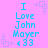 Pixelated cyan text on pink background with repeating square patterns, displaying "I Love John Mayer <33" in two identical vertical