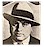 Pixelated grayscale icon of a person in profile wearing a flat-brimmed hat with visible facial features and clothing details.