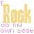 Pixelated text animation cycles through color variations of "I Rock to my own beatown beat" with yellow and pink lettering on white background.