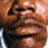 Animated sequence showing a person's face with water droplets, accompanied by text reading "IF YOU CAN'T GET OUT EVEN" and "LONGEST YARD" on dark background.