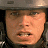 A 48x48 pixel buddy icon split into two frames showing a character in a helmet and green text reading "Original Icons .com" on a dark background.