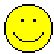 A 3x3 contact sheet of seven pixelated yellow smiley face icons with varying expressions, including standard smiles, winking eyes, and tongue-out poses, displayed on a gray background.