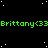 Green text reading "Brittany<33" repeats across three horizontal lines on a black background with scattered white dots, partially obscured by a gray rectangle in the bottom-right corner.