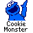 Pixelated blue Cookie Monster character with raised arm and open mouth next to text "Instant Icons .com" on gray background.