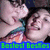 A pixelated image of two people in close proximity with text overlays, showing slight variations in text and color across frames.