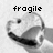 Pixelated grayscale image of a smiling face with the word 'fragile' in blocky text above it.