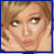A pixelated image of a person with light brown hair, showing two distinct facial expressions in separate