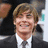 Pixelated image of a person in dark suit and white shirt with text on pink background reading 'You can just call me' and 'MRS. EFRON <3 <3 <3'