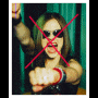 A static image with red and black sections containing repeated text "Proud to be" and a central photo of a person making a fist gesture, overlaid with two red X marks.