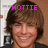 Pixelated image of a person with brown hair and closed eyes, overlaid with bright pink text reading HOTTIE.