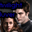 Pixelated image of two people with blue text reading 'twilight luvver' overlaid on a dark background.